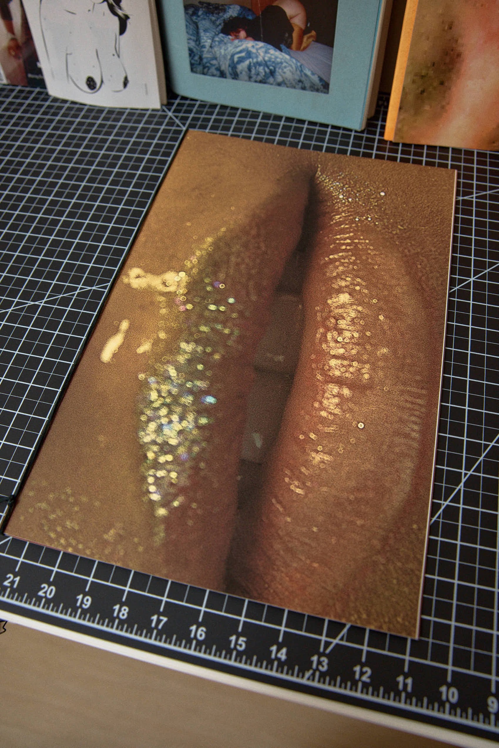 Close-up of glittered skin, book cover