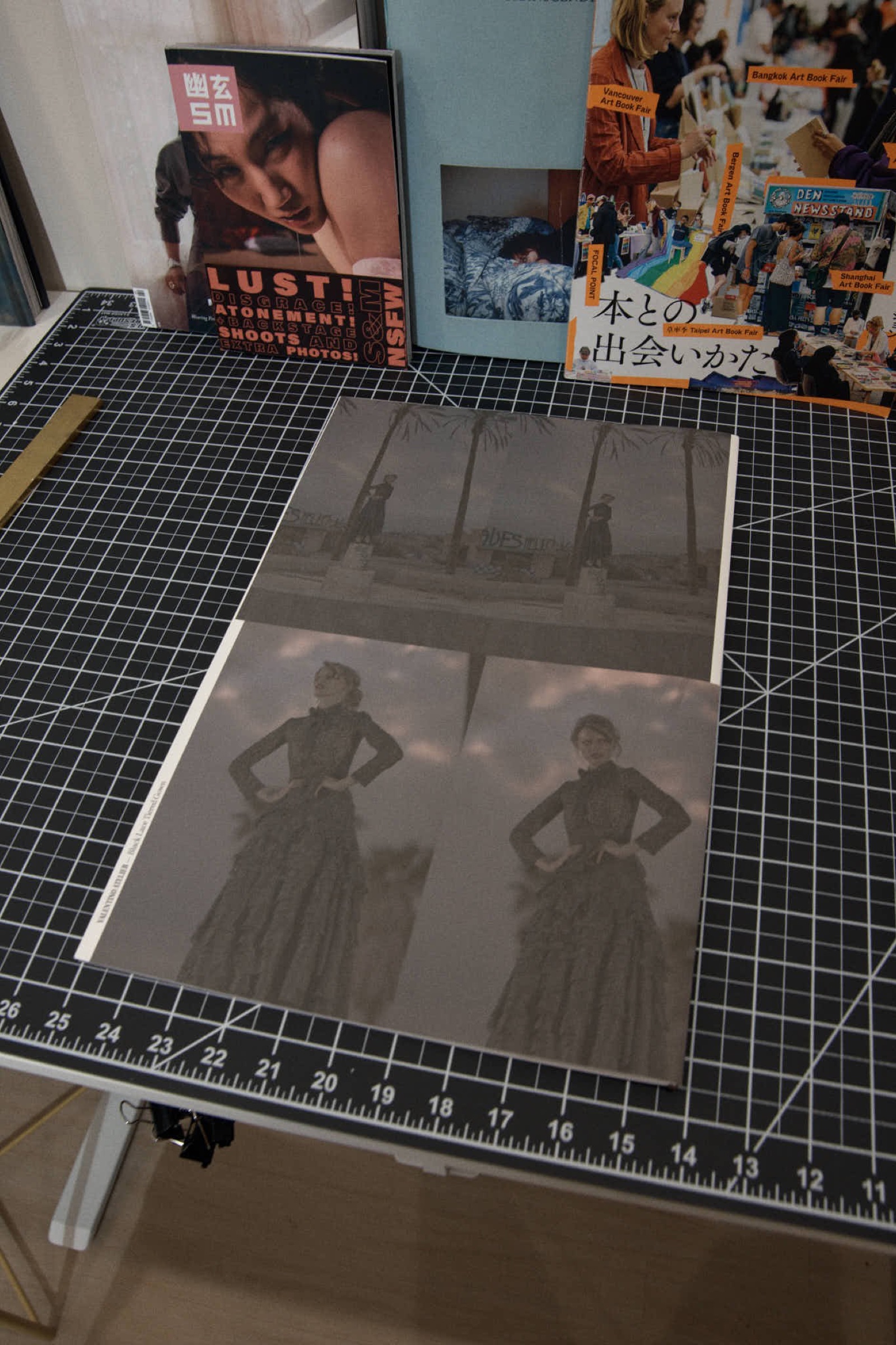 Open book spread, hazy black-and-white waterpark photograph