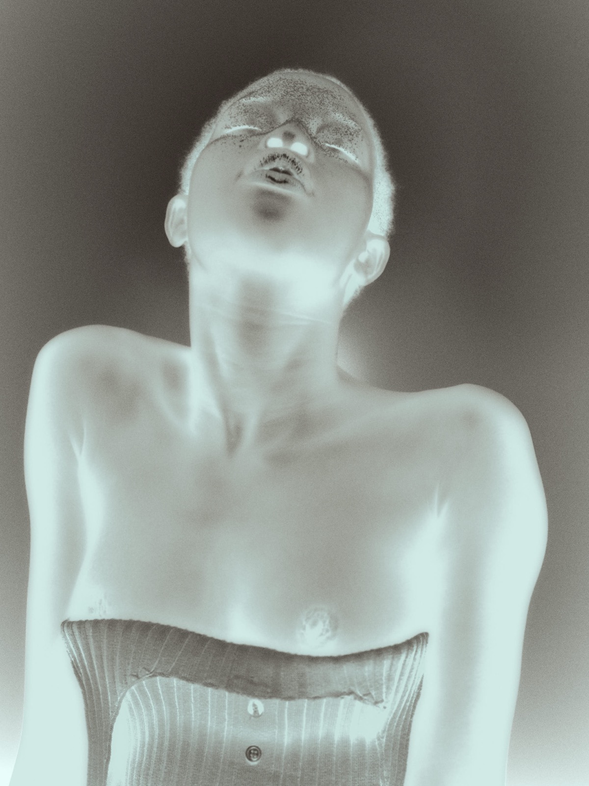 Film negative, head tilted back
